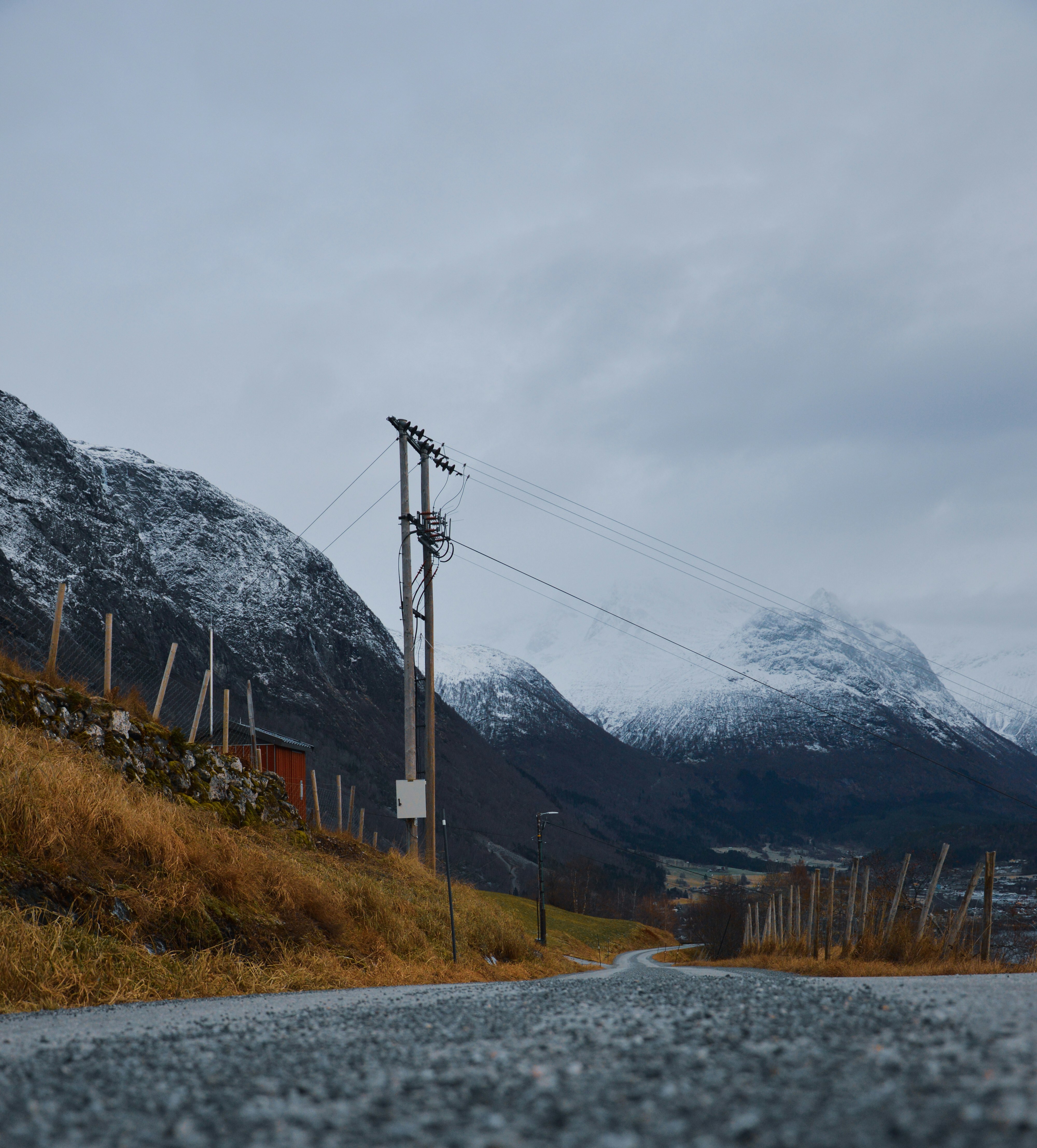 gray and white mountains under white cloudy sky during daytime